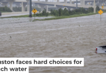 A roadside assistance vehicle is swamped by floodwaters on a Houston highway in 2024. Brandon Bell/Getty Images